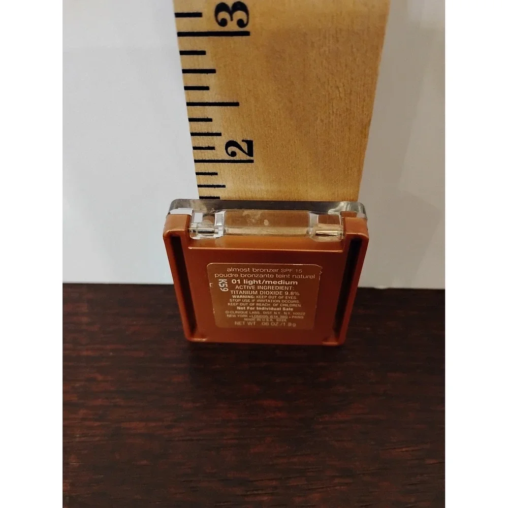Clinique Almost Bronzer SPF 15 01 Light/Medium Powder Duo Compact 0.06oz 1.8g